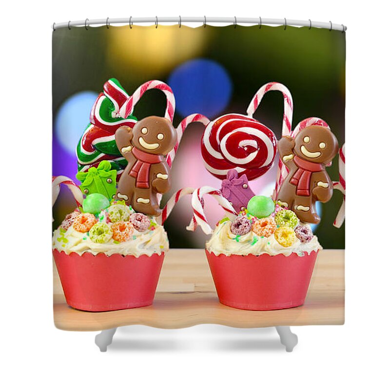 Christmas Shower Curtain featuring the photograph Candyland festive Christmas cupcakes. by Milleflore Images
