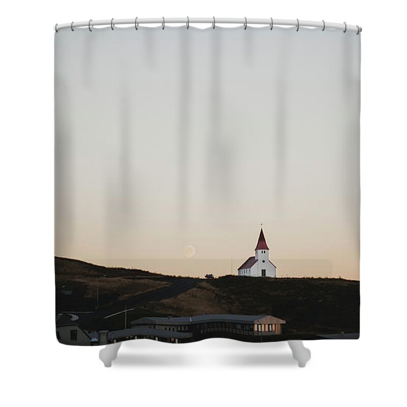 Architecture Shower Curtain featuring the photograph Church on top of a hill and under a mountain, with the moon in the background. by Joaquin Corbalan