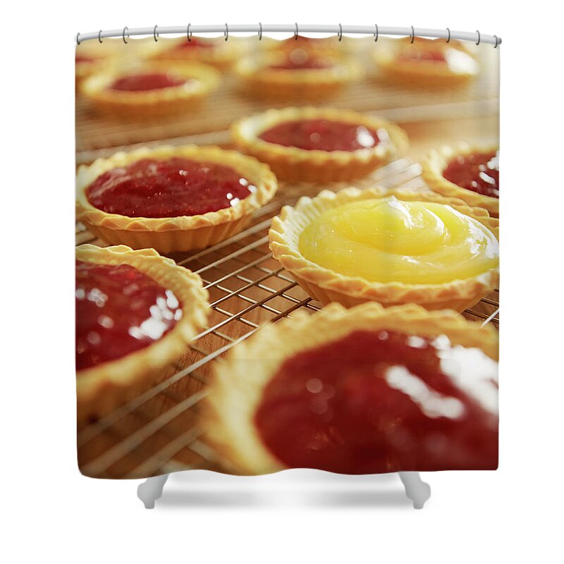 Cherry Shower Curtain featuring the photograph Close Up Of Jam Tarts Cooling On Wire by Adam Gault
