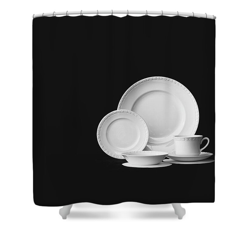 1962 Shower Curtain featuring the photograph Crockery Against Black Background by Tom Kelley Archive