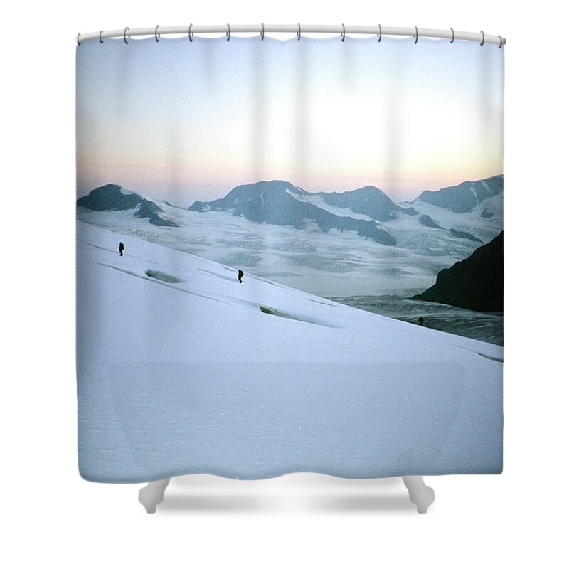Scenics Shower Curtain featuring the photograph Distant Climbers Cross A Glacier In The by Mark Fisher