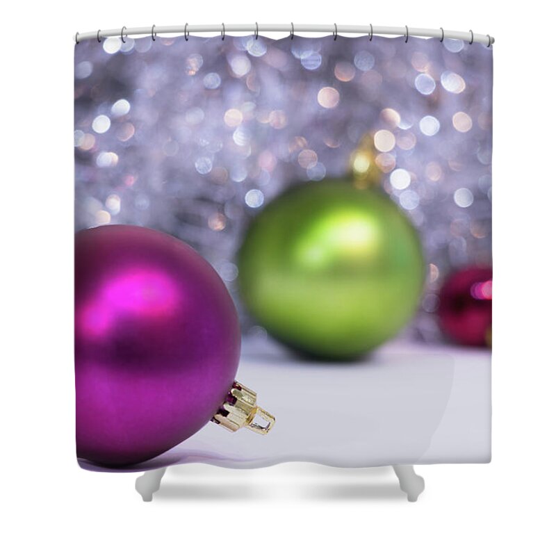 Artstudio29 Shower Curtain featuring the photograph Festive scene for Christmas with XMAS balls and lights in backgr by Cristina Stefan