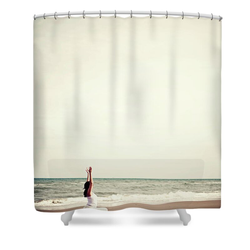 Water's Edge Shower Curtain featuring the photograph Girl Practicing Yoga On The Beach by Lindaobrien Photography