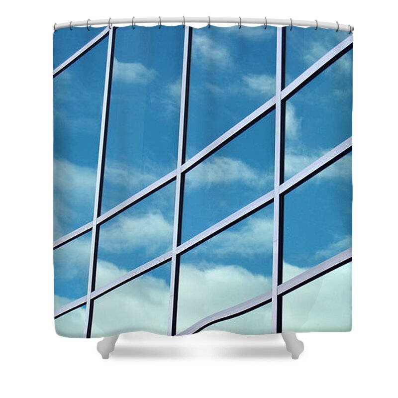 Curve Shower Curtain featuring the photograph Glass Building Reflecting Blue Skies by Michelangeloboy