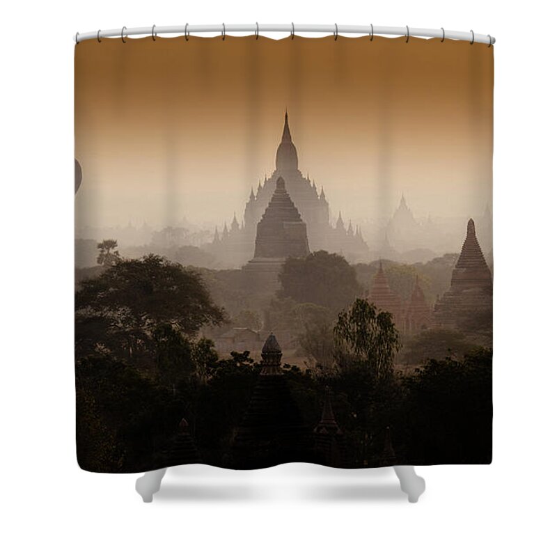 Pagoda Shower Curtain featuring the photograph Hot-air Balloon Floating Over The by Mint Images - Art Wolfe