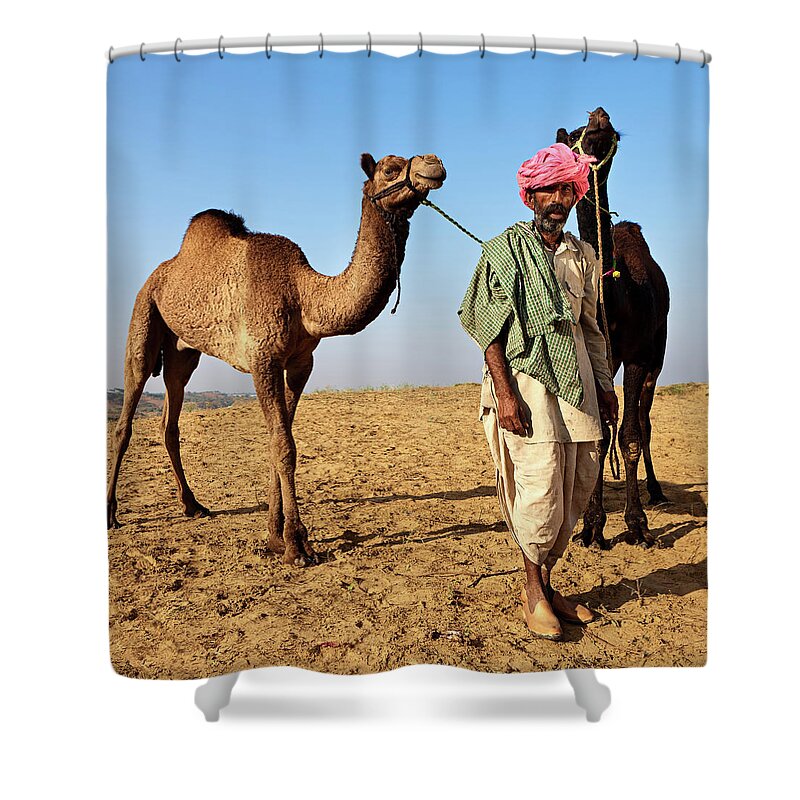 Indian Subcontinent Ethnicity Shower Curtain featuring the photograph Indian Man With Camels During Festival by Hadynyah
