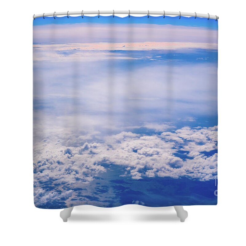 Across Shower Curtain featuring the photograph Intense blue sky with white clouds and plane crossing it, seen from above in another plane. by Joaquin Corbalan