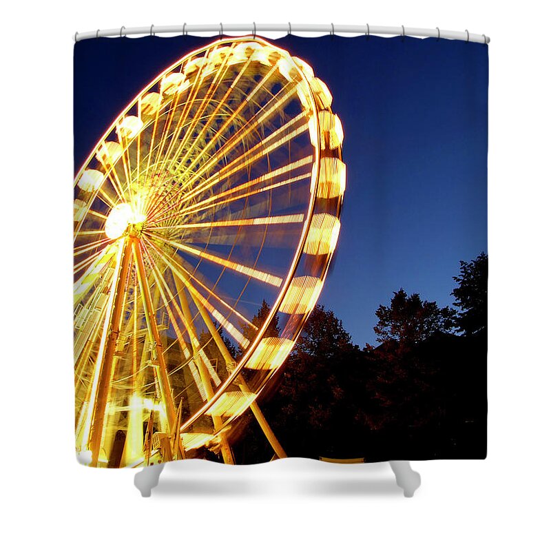 Curve Shower Curtain featuring the photograph Lighted Ferris Wheel Spinning In Motion by Vfka