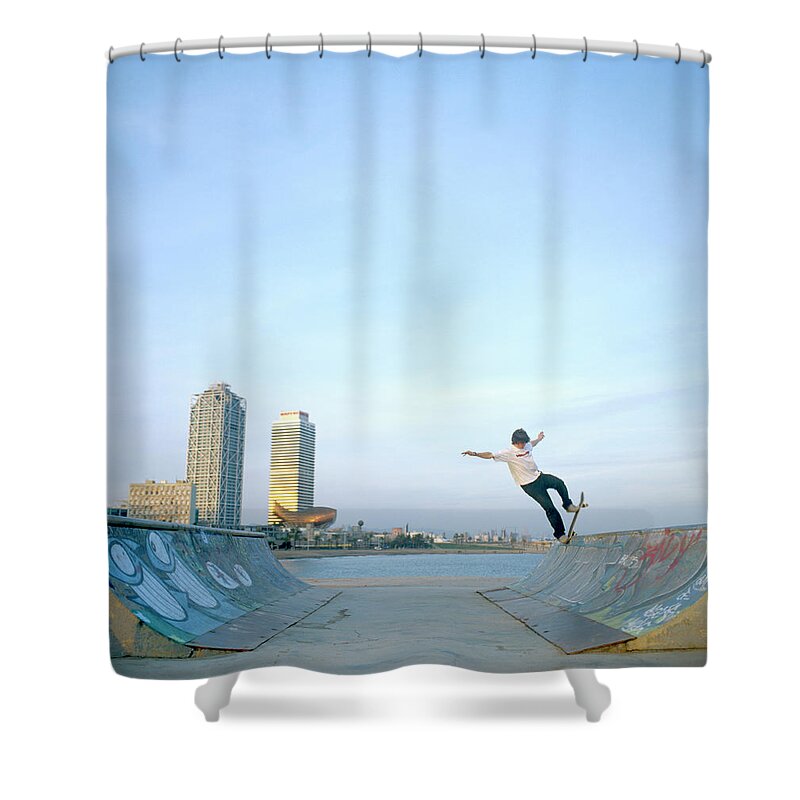 Human Arm Shower Curtain featuring the photograph Man Balancing Skateboard On Ramp by Paul Calver