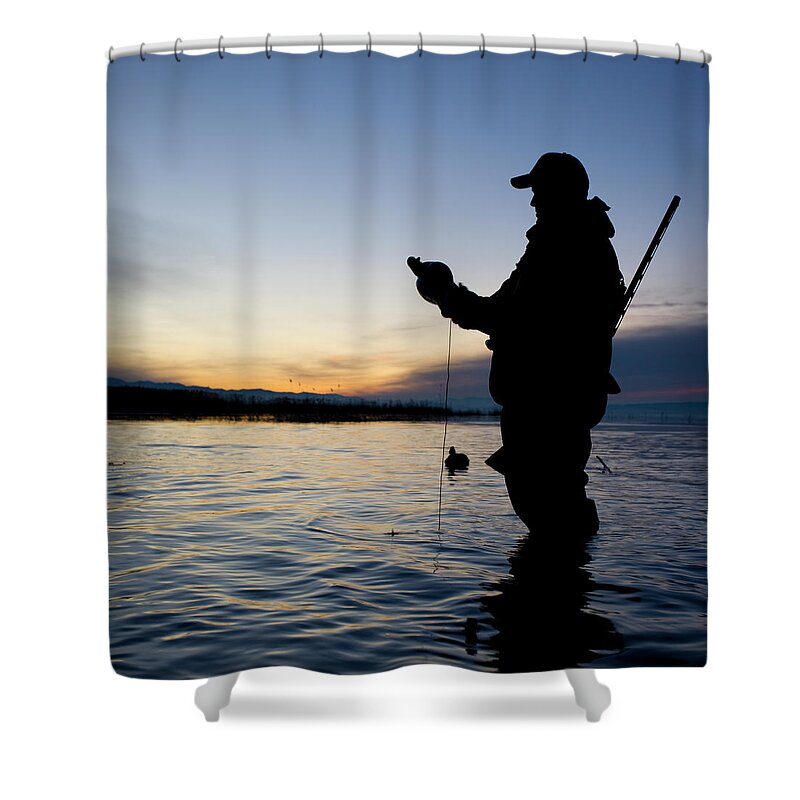 Rifle Shower Curtain featuring the photograph Man Duck Hunting by Rubberball Productions