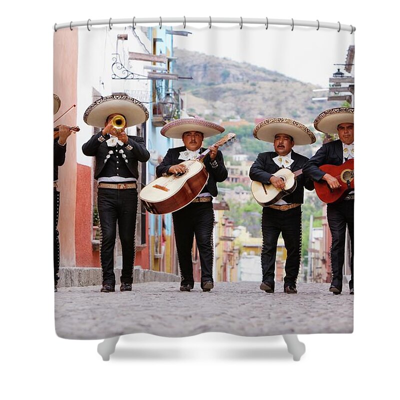 Mature Adult Shower Curtain featuring the photograph Mariachi Band Walking In Street by Pixelchrome Inc