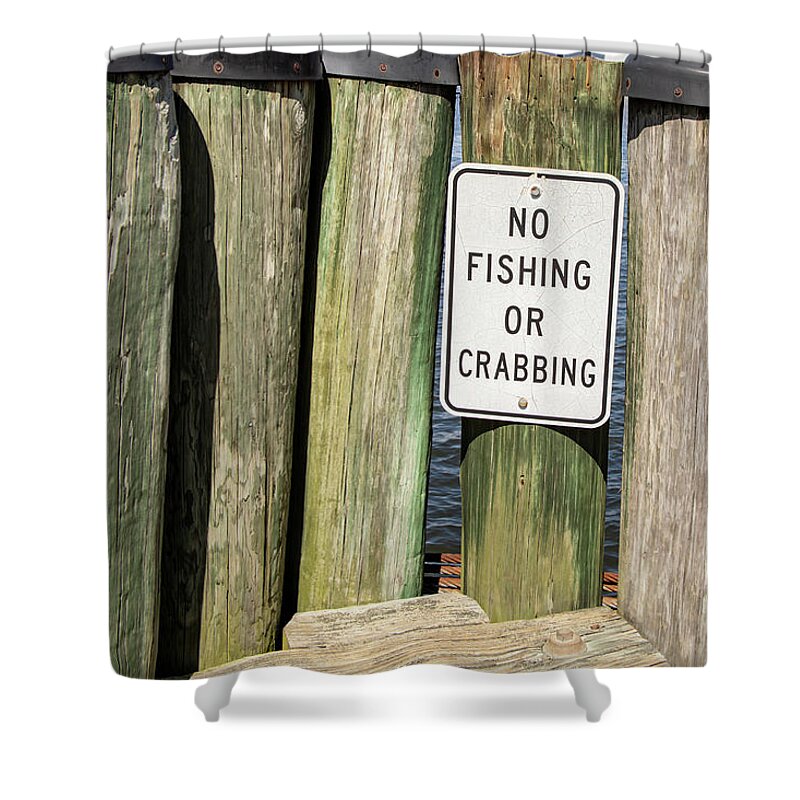 America Shower Curtain featuring the photograph No fishing or crabbing sign by Karen Foley