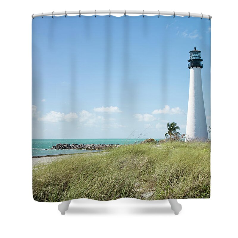 Grass Family Shower Curtain featuring the photograph Ocean And Coast With Lighthouse by Inti St. Clair