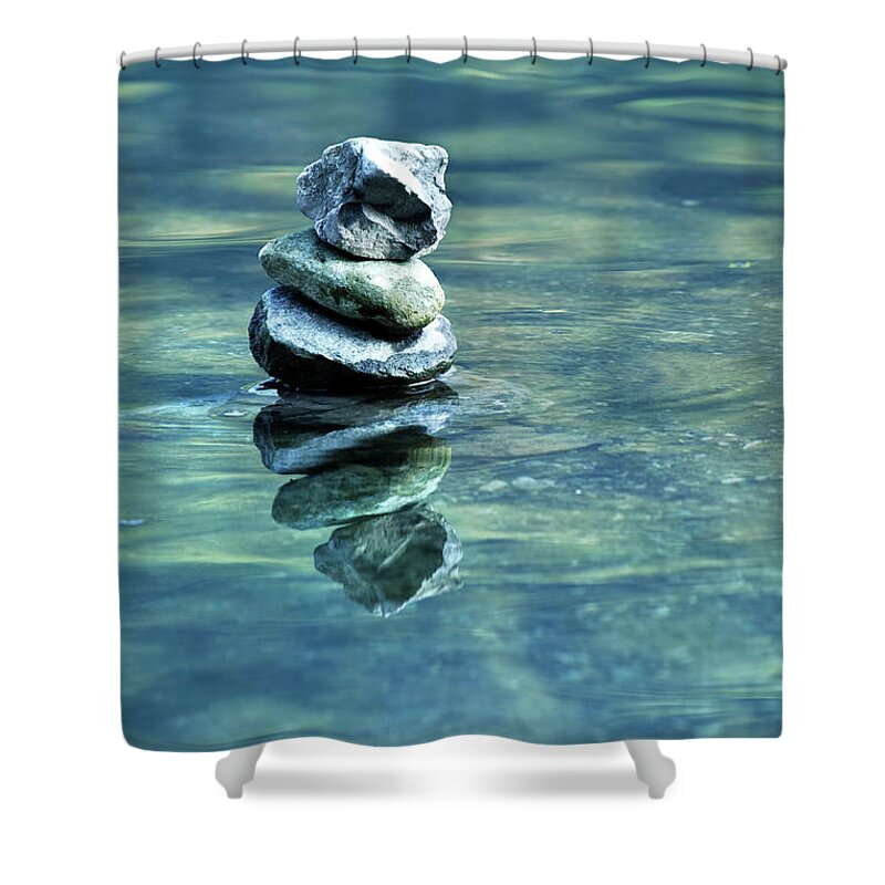 Heap Shower Curtain featuring the photograph Pebble Stack In Water by Fotogaby