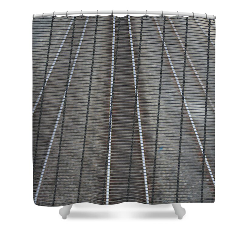 Railroad Track Shower Curtain featuring the photograph Railroad Tracks Seen Through Metal Fence by Aaron Mccoy
