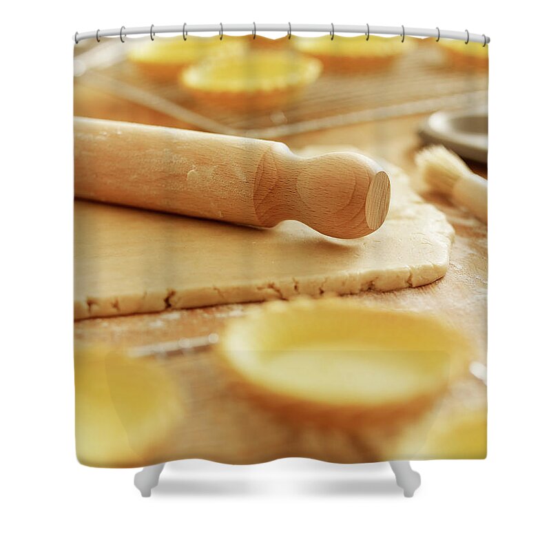 Rolling Pin Shower Curtain featuring the photograph Rolling Pin On Dough Surrounded By Puff by Adam Gault
