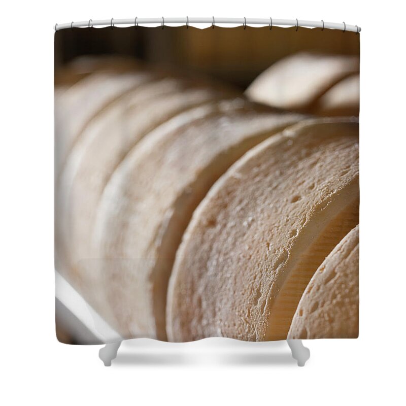 Cheese Shower Curtain featuring the photograph Row Of Handmade Cheese Rounds by Lewis Mulatero