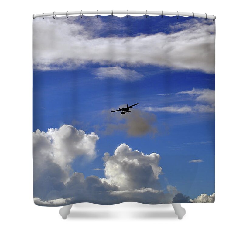A Seaplane Is Silhouetted Against Blue Sky And White Puffy Clouds. Shower Curtain featuring the photograph Seaplane Skyline by Climate Change VI - Sales