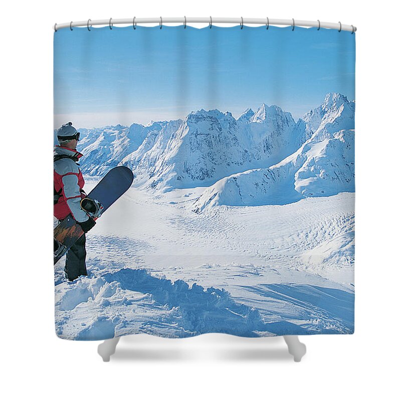 Three Quarter Length Shower Curtain featuring the photograph Side View Of A Snowboarder Looking At by Digital Vision.