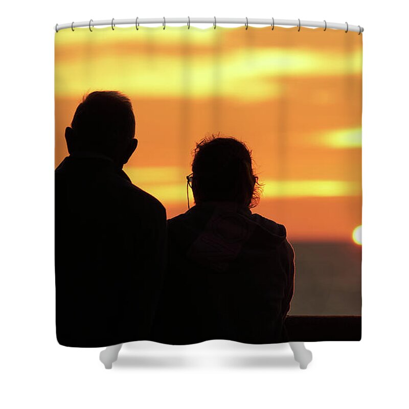 Happiness Shower Curtain featuring the photograph Silhouetted Old Couple Staring at the Sunset by Pablo Avanzini