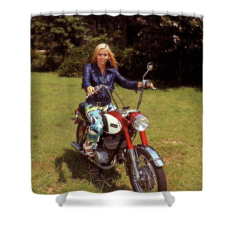 Engine Shower Curtain featuring the photograph Smiling Blonde Woman Sitting On Red by H. Armstrong Roberts