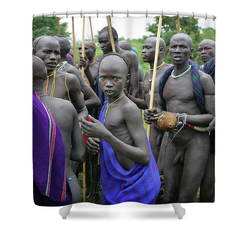Young Men Shower Curtain featuring the photograph Suri Tribal Warriors With Sticks At by Timothy Allen