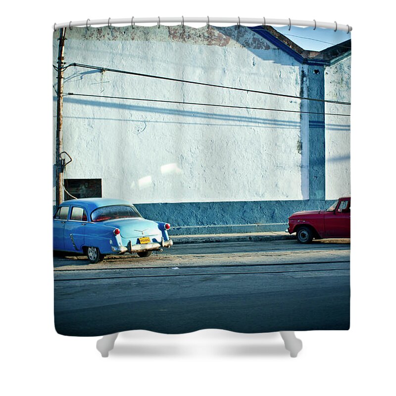 Built Structure Shower Curtain featuring the photograph Vintage Cars Parked On City Street by Redheadpictures