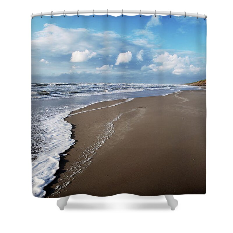Water's Edge Shower Curtain featuring the photograph Waves Rolling Up A Stormy Beach At by Vithib