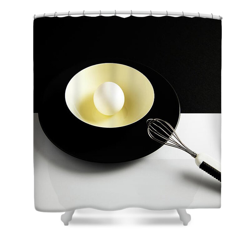 Egg Shower Curtain featuring the photograph White egg on a yellow bowl. by Michalakis Ppalis