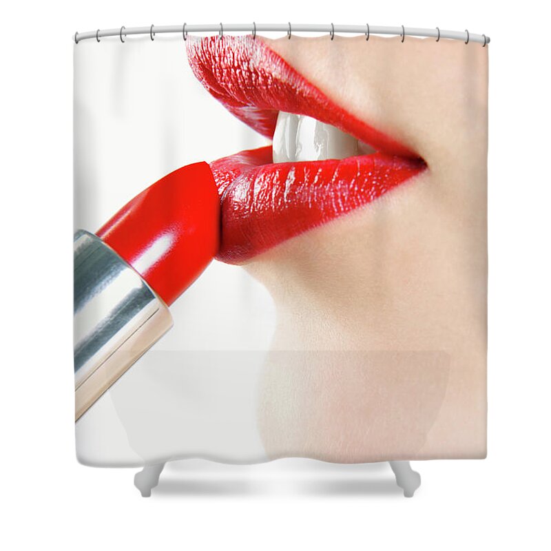 White Background Shower Curtain featuring the photograph Woman Applying Red Lipstick by Digital Vision.