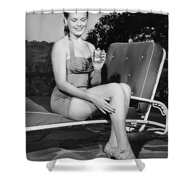 People Shower Curtain featuring the photograph Woman On Lawn Chair Applying Oil To Her by George Marks
