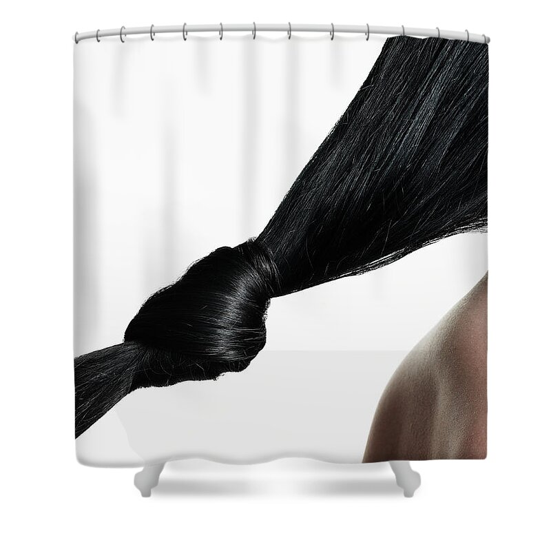 People Shower Curtain featuring the photograph Woman With Hair Tied In Knot, Close-up by Christopher Robbins