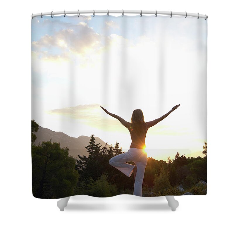 Human Arm Shower Curtain featuring the photograph Young Woman Balancing On Rock by Janie Airey