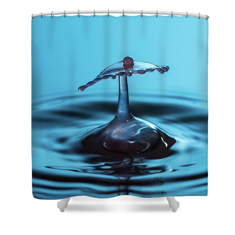 Waterdrop Shower Curtain featuring the photograph Water drop falling onto column of water #1 by Steven Heap