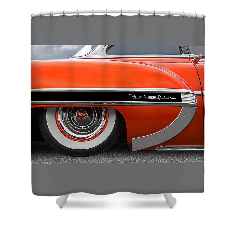 Classic Chevy Shower Curtain featuring the photograph 1954 Chevy Bel Air Rear Fender Badge And Wheel by Gill Billington