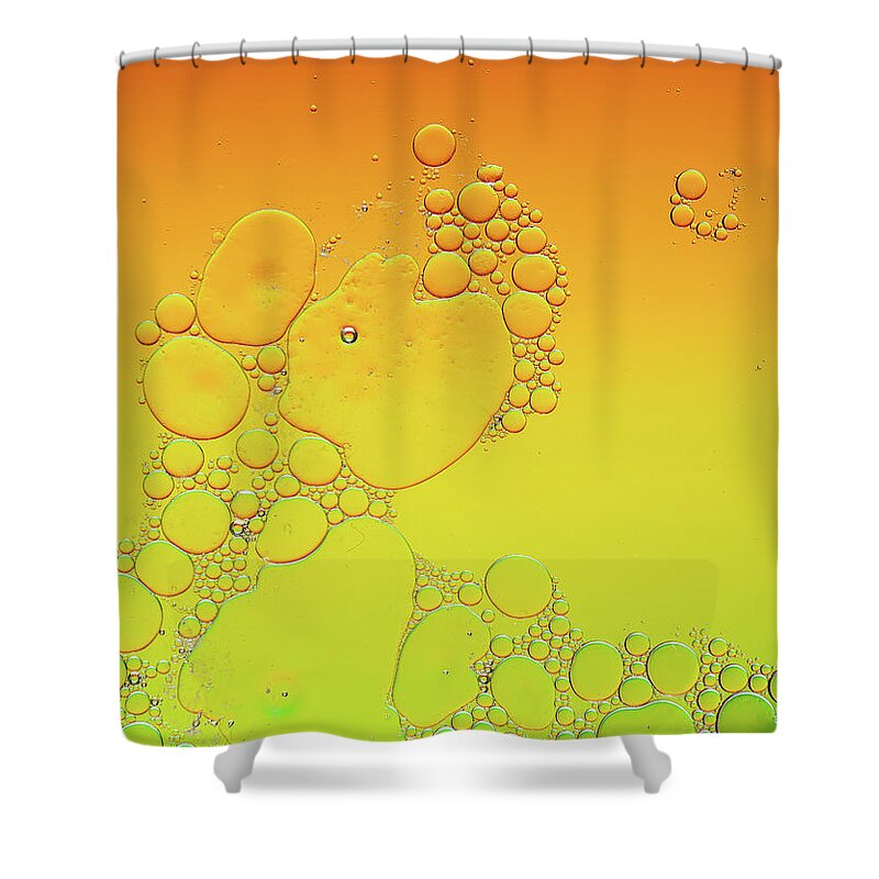 Connection Shower Curtain featuring the photograph Bright abstract, yellow background with flying bubbles by Michalakis Ppalis