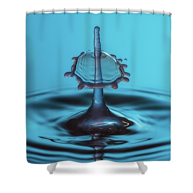 Waterdrop Shower Curtain featuring the photograph Water drop falling onto column of water by Steven Heap