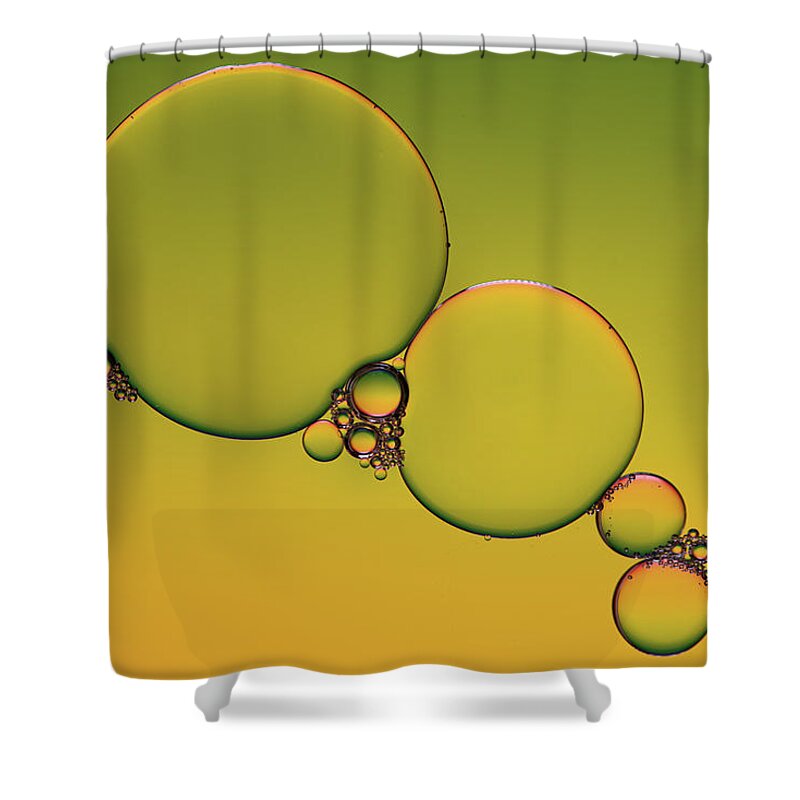 Connection Shower Curtain featuring the photograph Bright abstract, yellow background with flying bubbles by Michalakis Ppalis