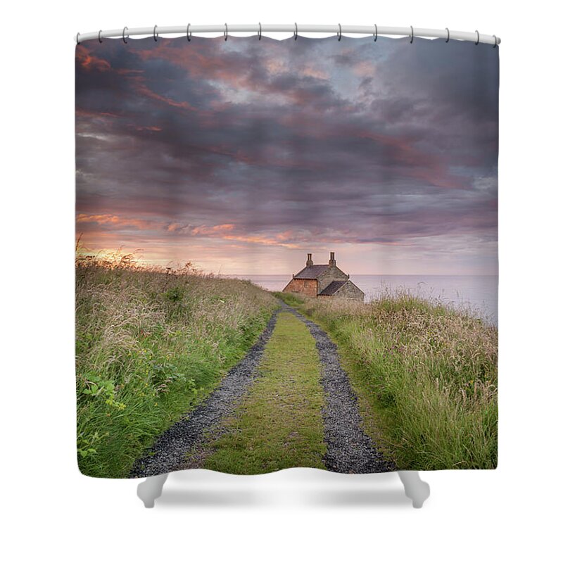 Northumberland Shower Curtain featuring the photograph A cottage by the sea by Anita Nicholson