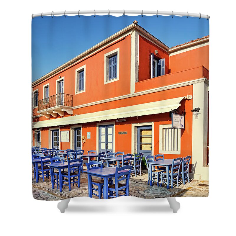 Fiscardo Shower Curtain featuring the photograph A fish restaurant at Fiskardo in Kefalonia, Greece by Constantinos Iliopoulos