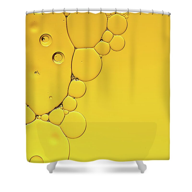 Fluid Shower Curtain featuring the photograph Abstract, image of oil, water and soap with colourful background by Michalakis Ppalis