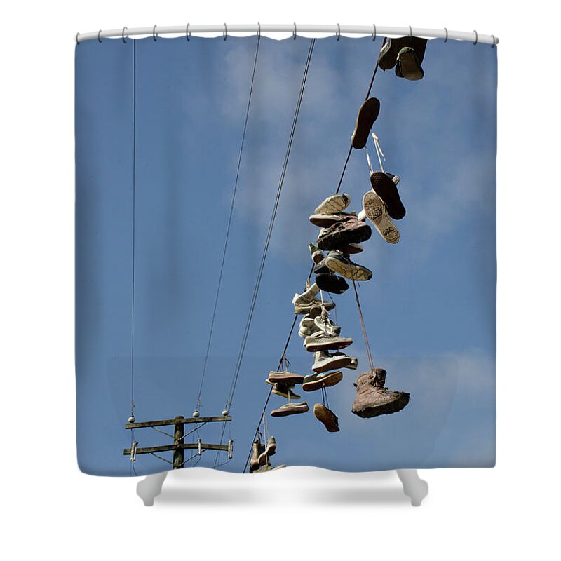 Shoe Shower Curtain featuring the photograph At The End Of The Line by Bob Christopher