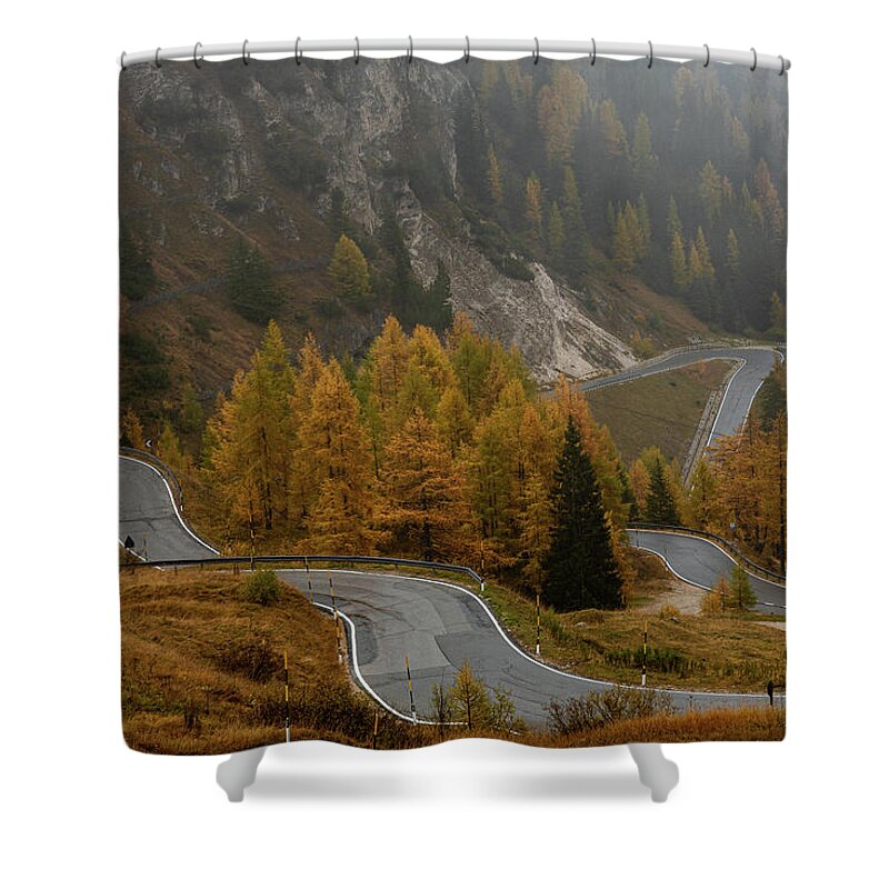 Italian Alps Shower Curtain featuring the photograph Autumn landscape with curved road. Passo di falzarego South Tyrol in Italy by Michalakis Ppalis