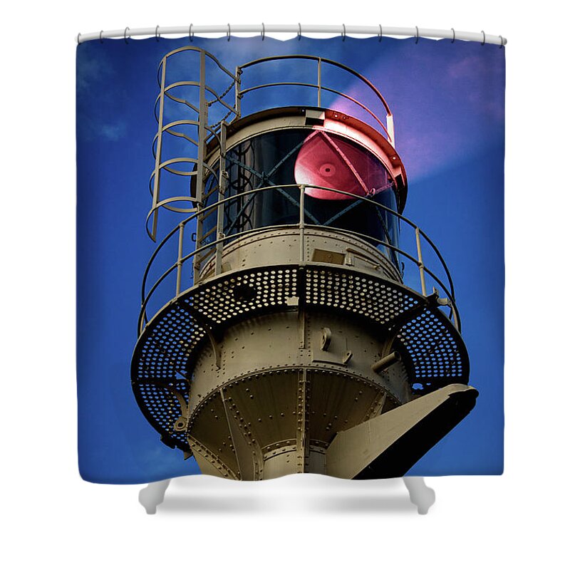 Lighthouse Shower Curtain featuring the photograph Beam of light from a lighthouse. by Bernhard Schaffer
