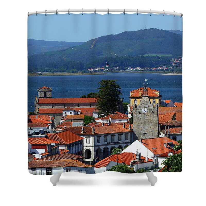 Portugal Shower Curtain featuring the photograph Caminha Old Town rooftops and towers Portugal by James Brunker
