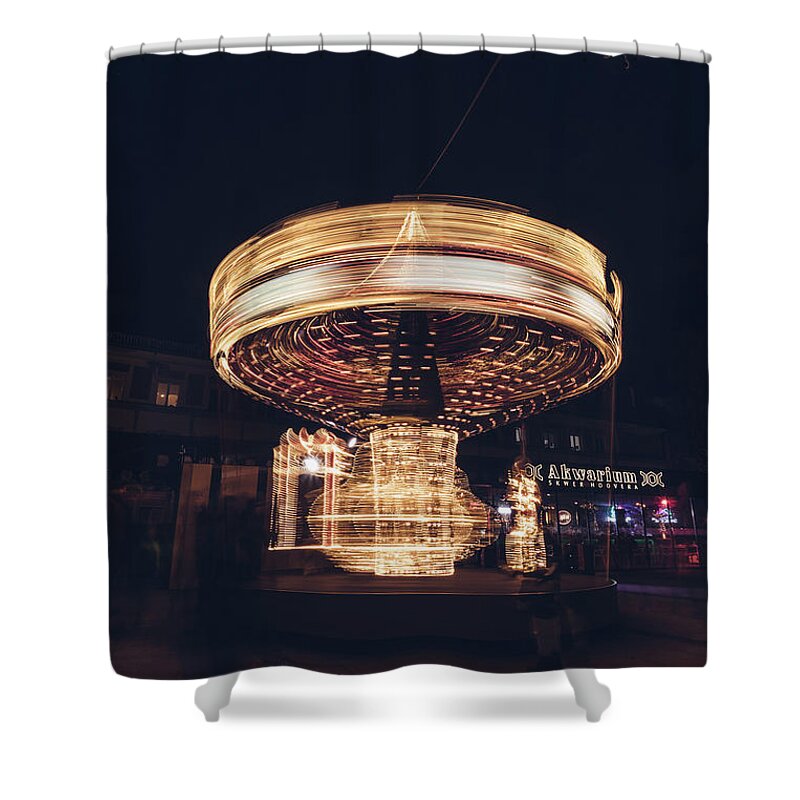 Illuminations Shower Curtain featuring the photograph Christmas carousel on the streets of Warsaw. Fire Wheel by Vaclav Sonnek
