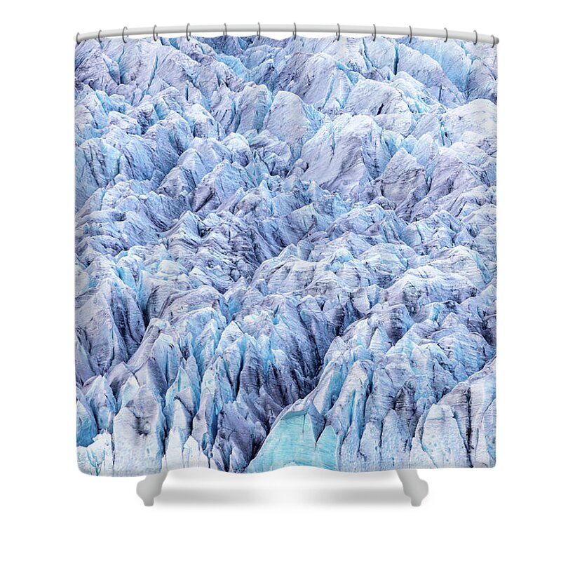 Fjallsarlon Shower Curtain featuring the photograph Close up detail of the compressed glacial blue ice of the Fjallsjokull glacier, Southern Iceland. Part of the Vatnajokull National Park by Jane Rix
