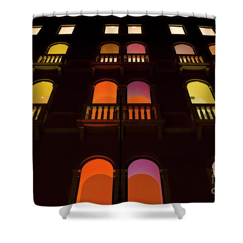 Venice Italy Shower Curtain featuring the photograph Coloured lights in the windows of the Benetton building in Venice, Italy by Neale And Judith Clark