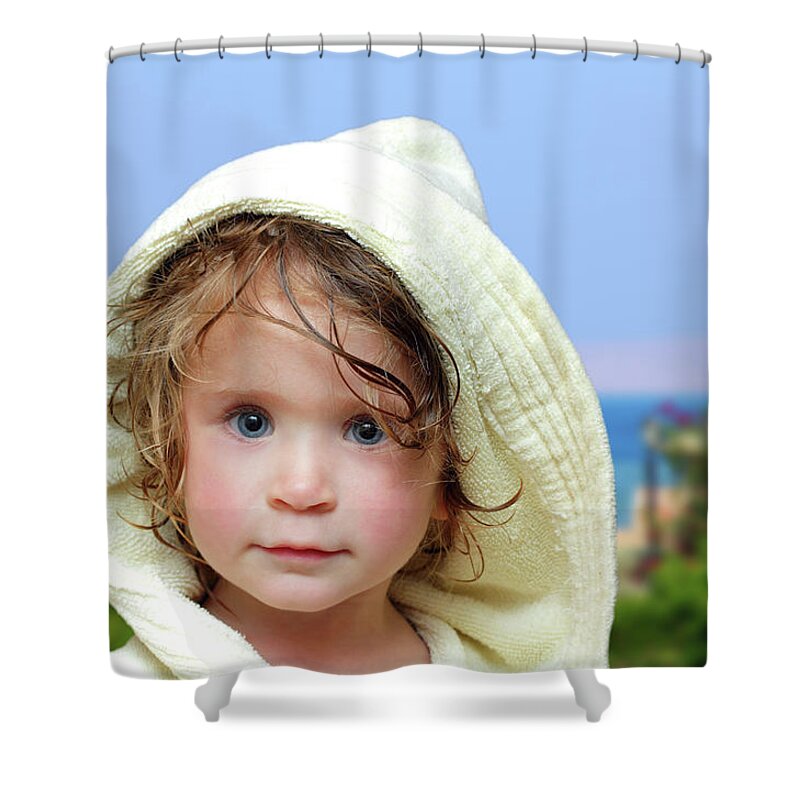 Childhood Shower Curtain featuring the photograph Cute Girl In Bathrobe On Beach by Mikhail Kokhanchikov