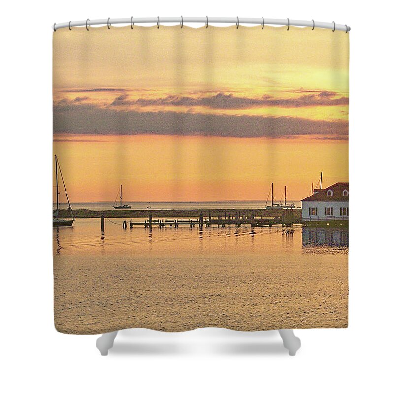 A Sailboat Gets An Early Start On A Summer Morning In Cuttyhunk Harbor. Gosnold Massachusetts Buzzards Bay Cape Cod Morning Sunrise Life Saving Station Uscg Shower Curtain featuring the photograph Day Begins by Nautical Chartworks